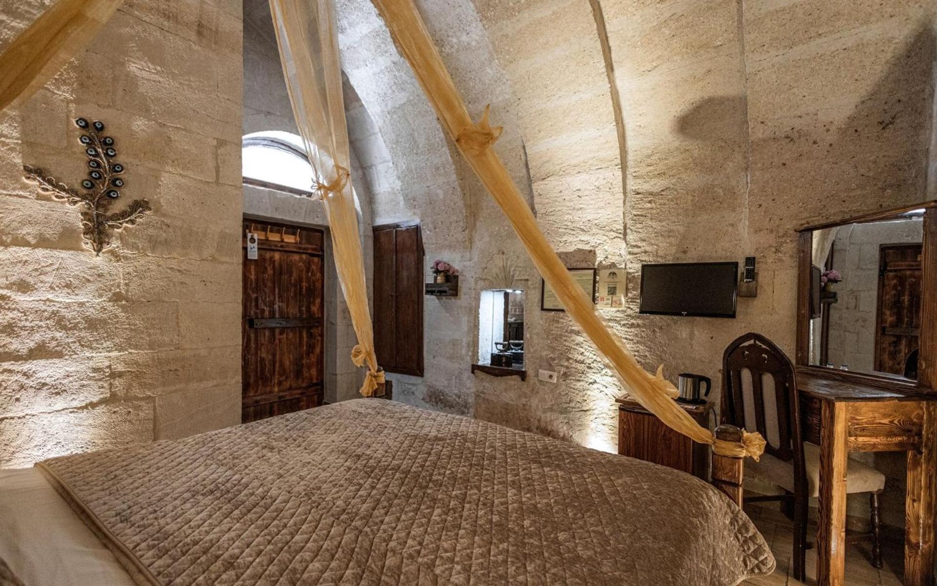 Maccan Cave Hotel Гьореме Стая снимка