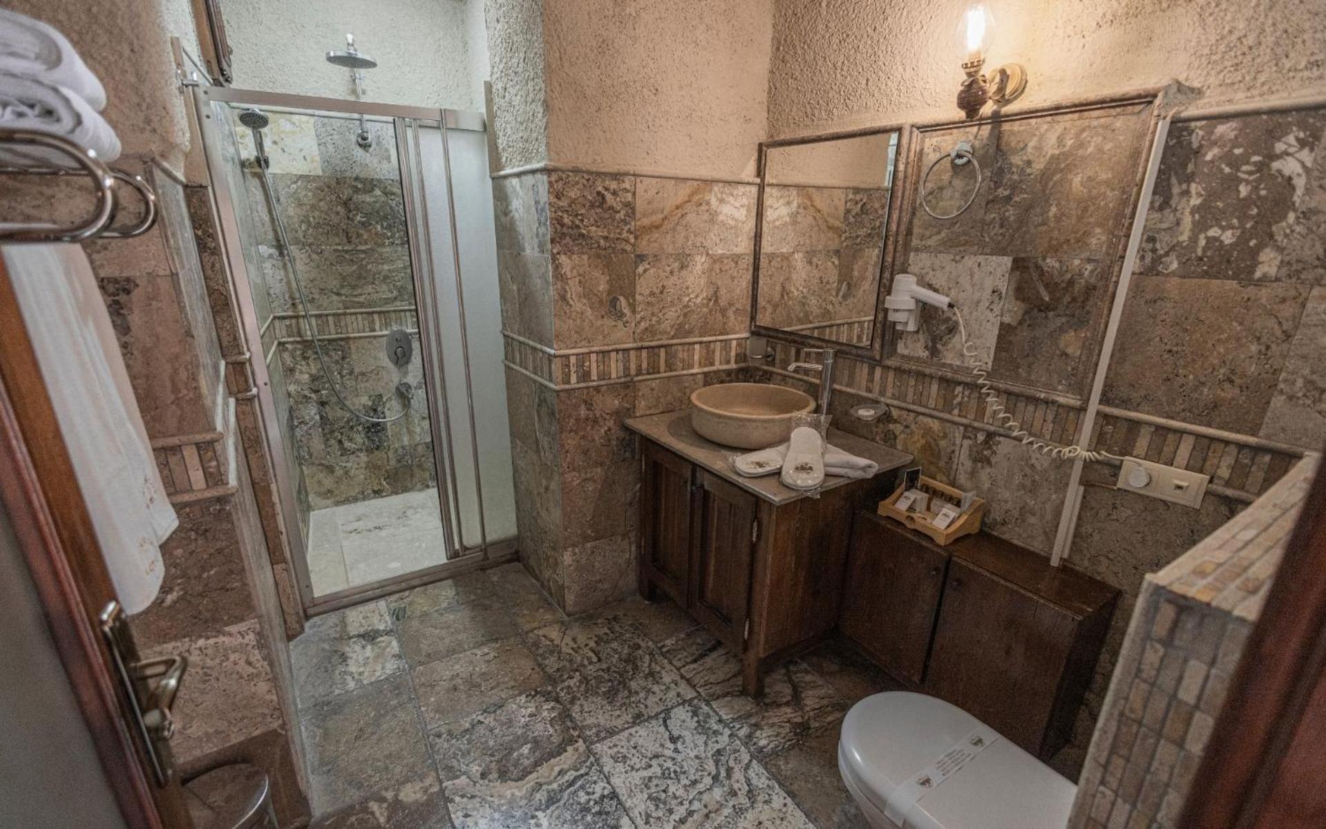Maccan Cave Hotel Гьореме Стая снимка