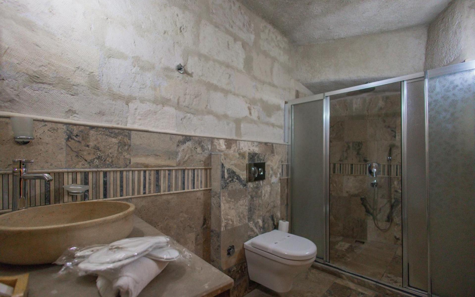 Maccan Cave Hotel Гьореме Стая снимка