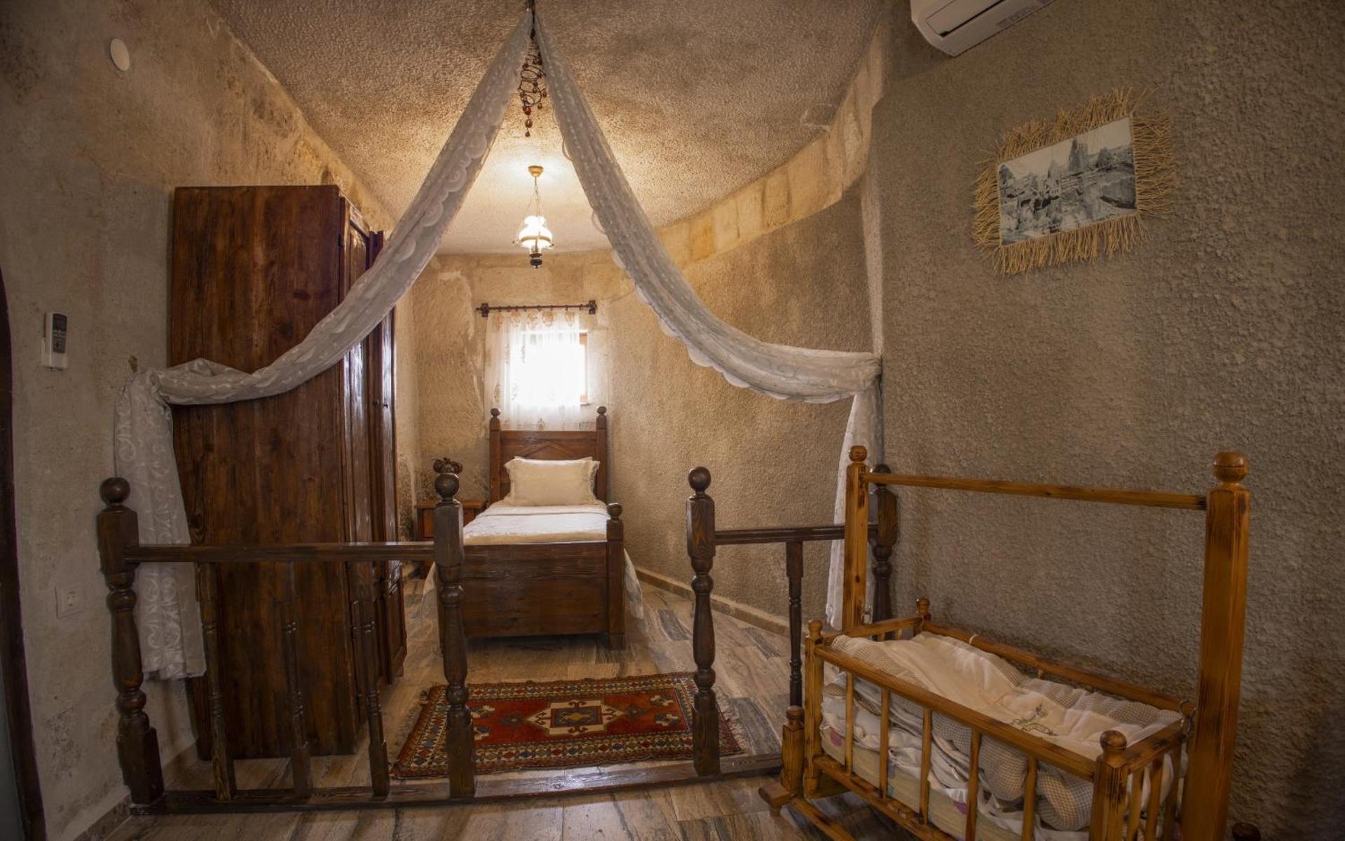 Maccan Cave Hotel Гьореме Стая снимка