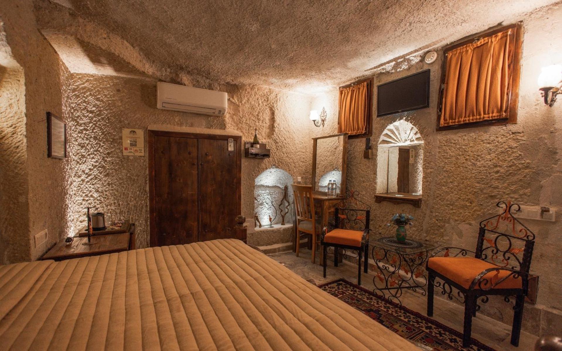 Maccan Cave Hotel Гьореме Стая снимка