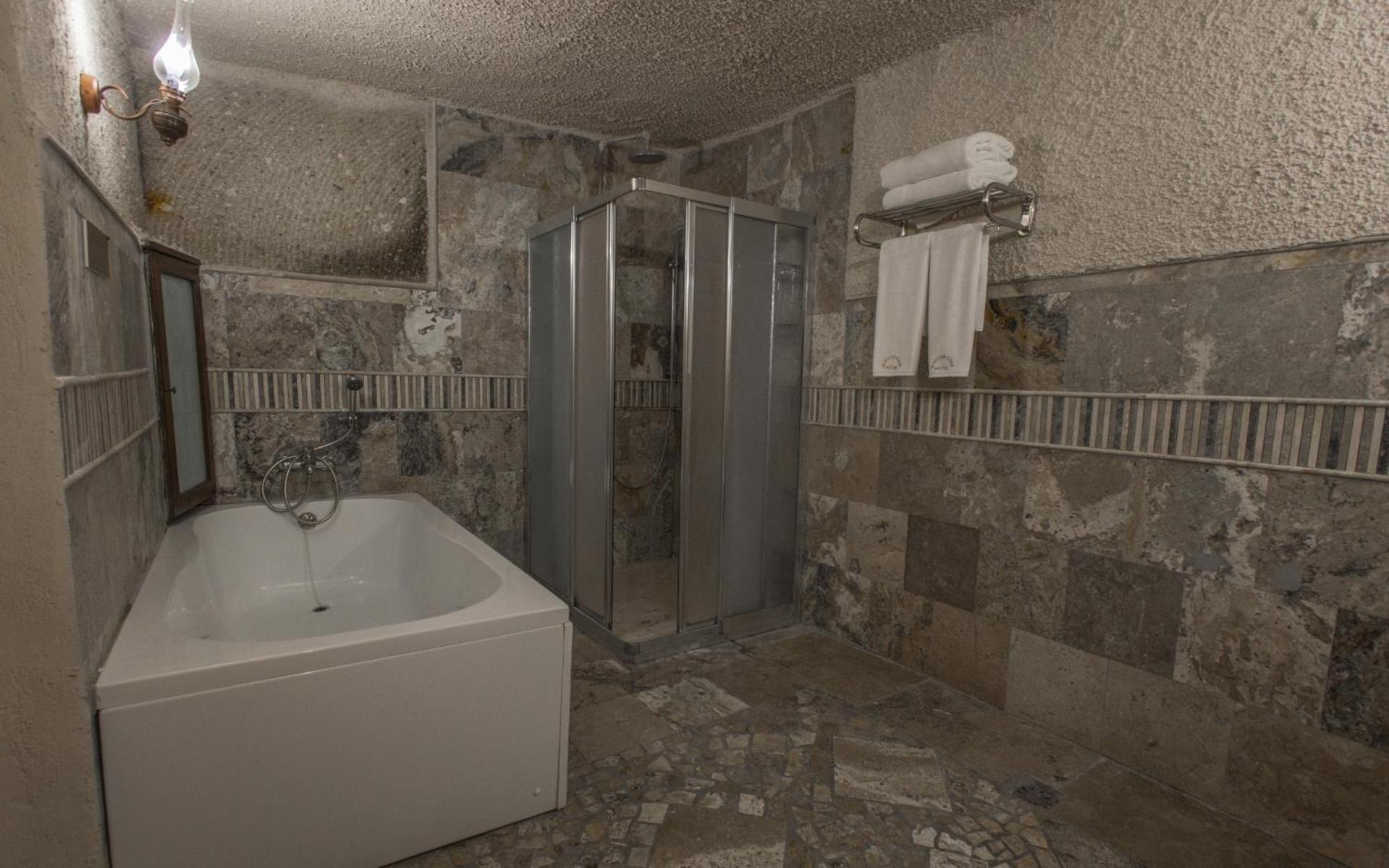 Maccan Cave Hotel Гьореме Стая снимка
