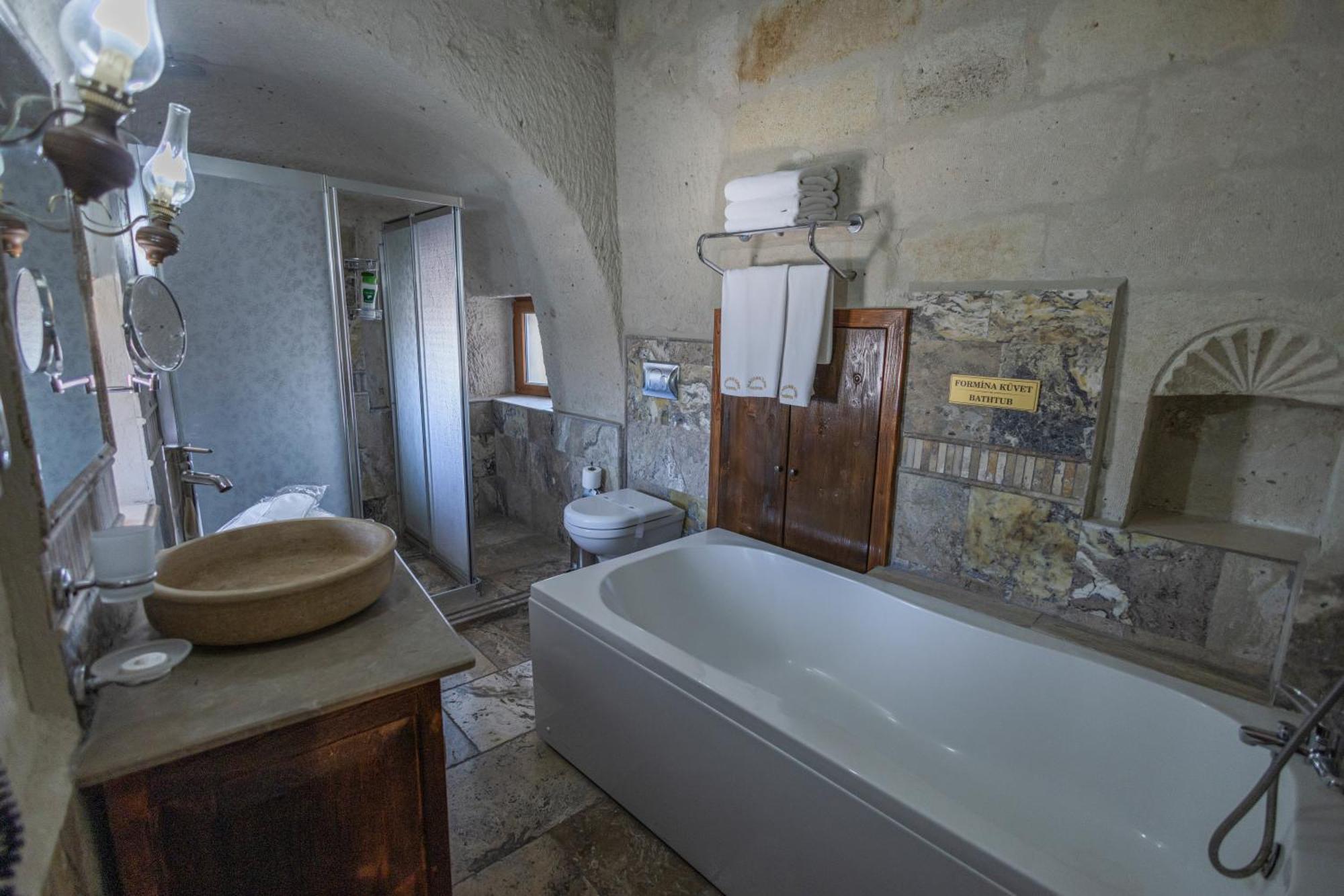 Maccan Cave Hotel Гьореме Стая снимка